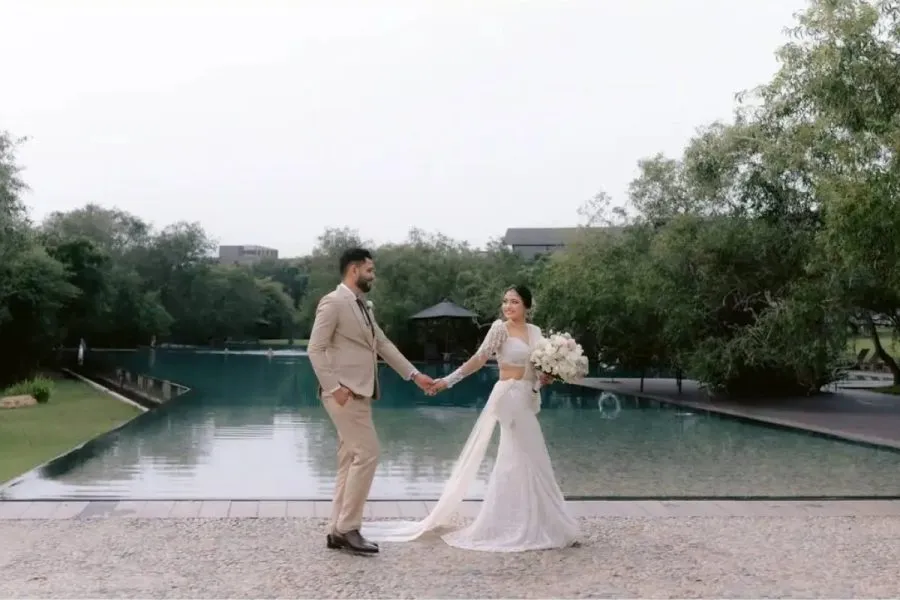 Bride and groom by the pool - Endora Wedding Highlights