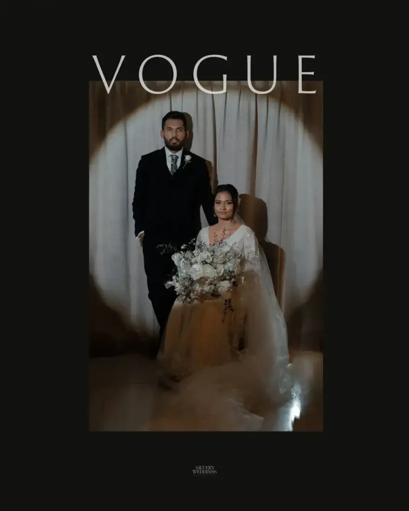 Bride and groom editorial portrait in warm spotlight